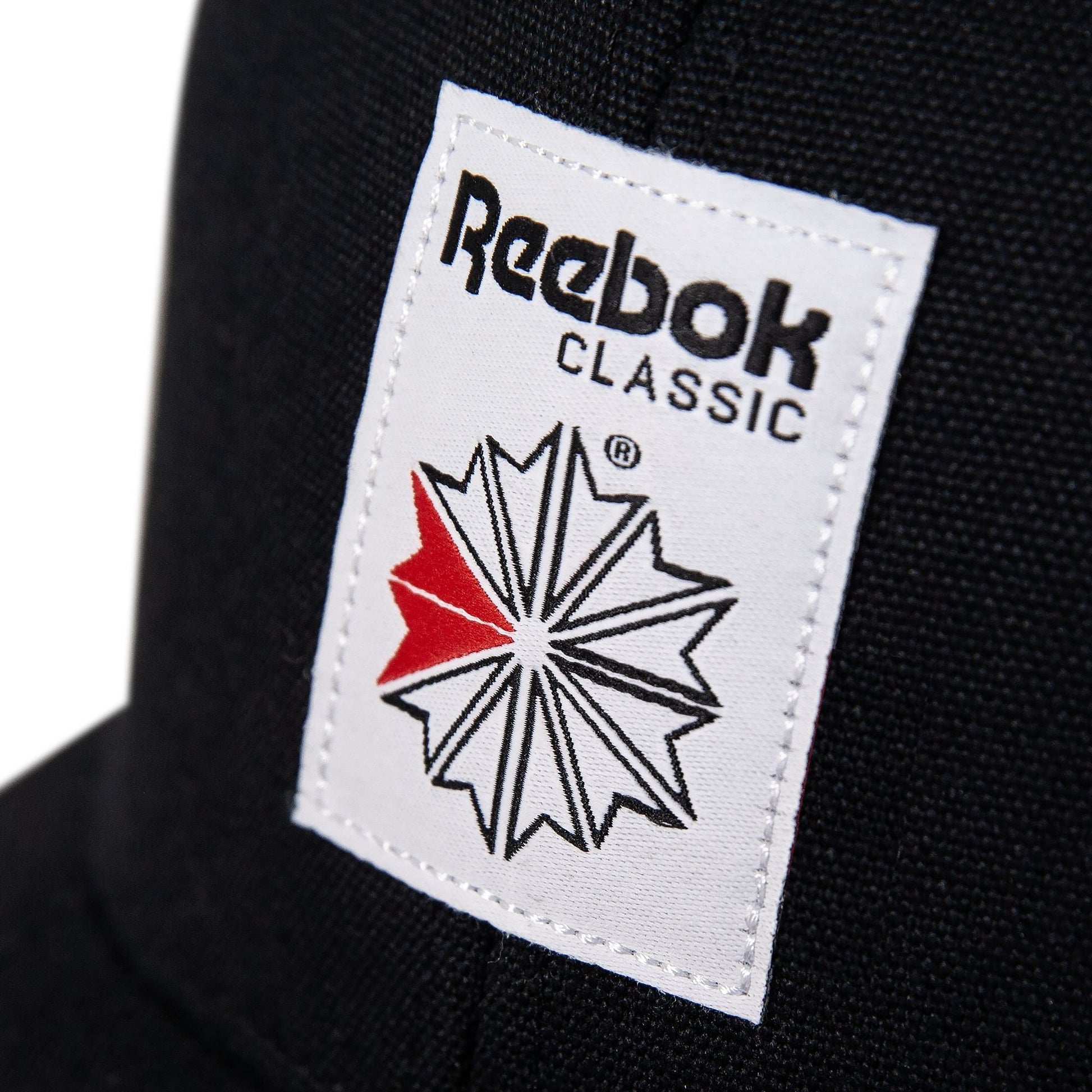 Reebok Men Woven Patch Vector Trucker Cap