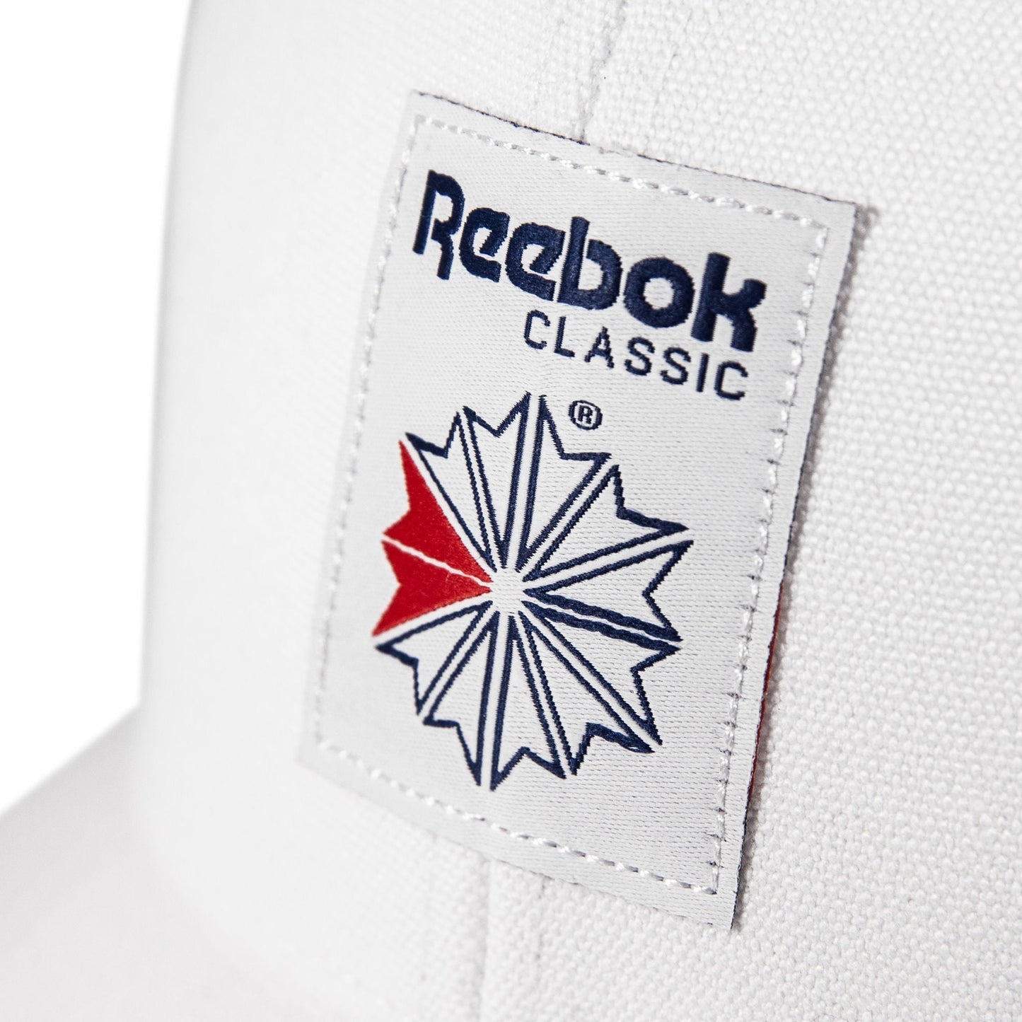 Reebok Women Woven Patch Vector Trucker Cap